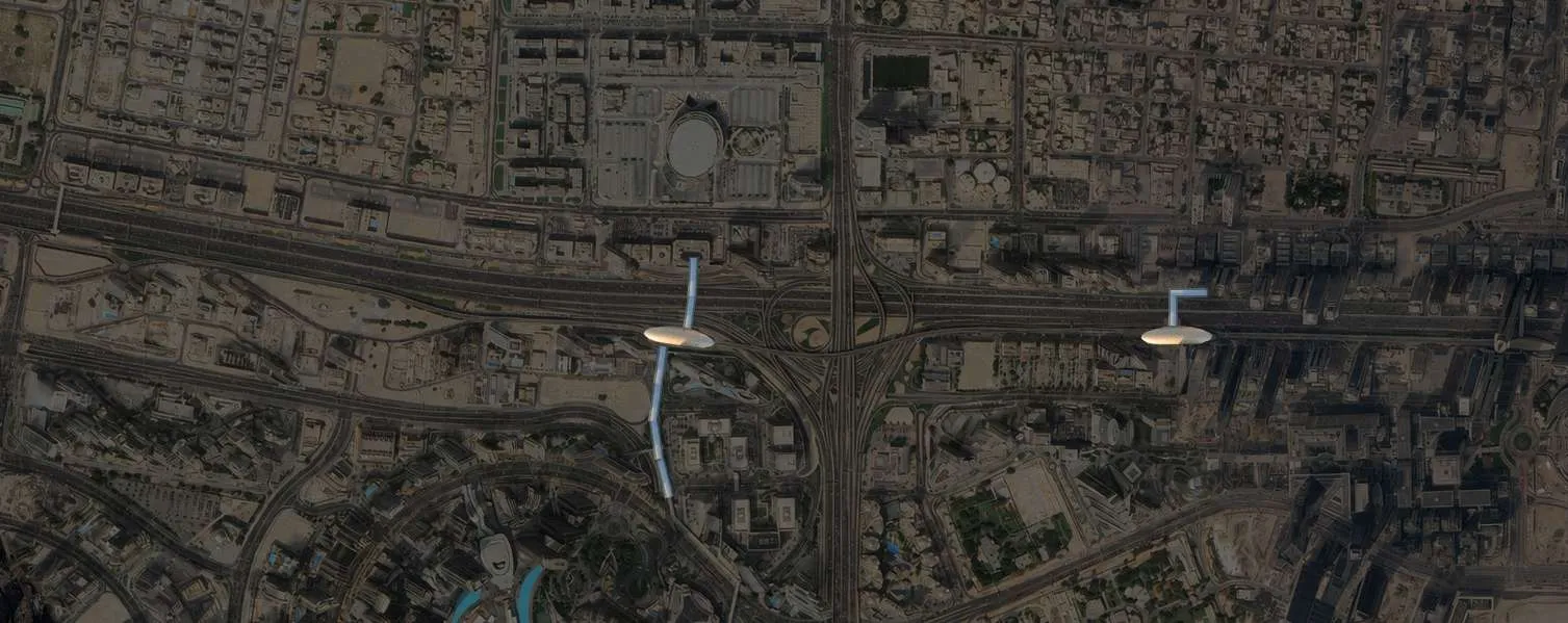 Aerial view of Sheikh Zayed Road around AHS Twin Towers and its metro stations