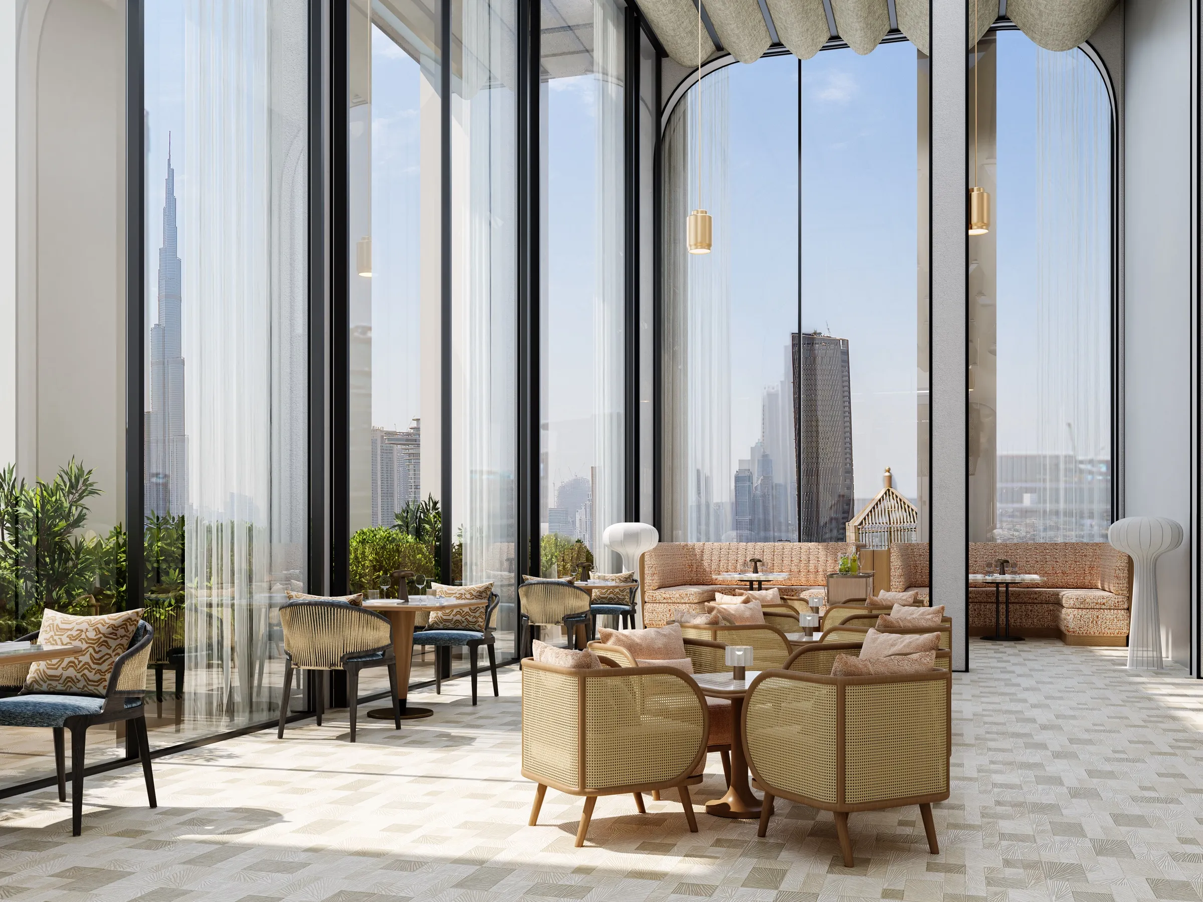 Rooftop lounge seating facing Burj Khalifa at AHS Twin Towers